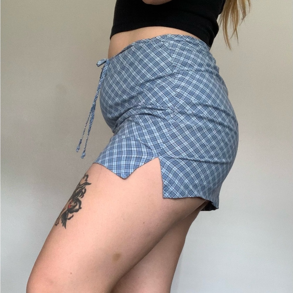 Star City Clothing Co 90’s blue plaid mini skirt with tie detail and side slits